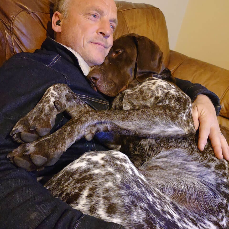 Warren and Ralph have a cuddle